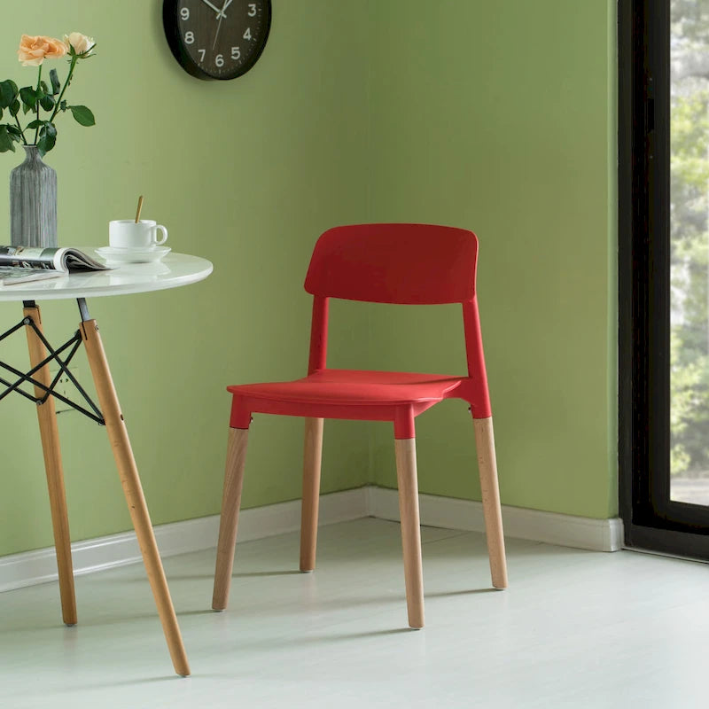 Chaise de salle à manger moderne en plastique à dossier ouvert avec pieds en bois de hêtre